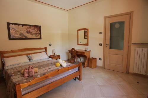 Postel nebo postele na pokoji v ubytování Bed and Breakfast Luna