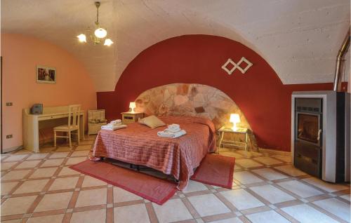 Tempat tidur dalam kamar di La Pedrera