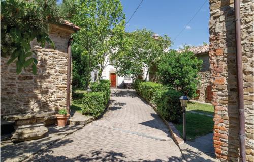 a brick walkway in front of a house at Palazzo 2P in Polvano