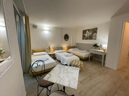 Postel nebo postele na pokoji v ubytování B&B La Magia dei Sogni Relais