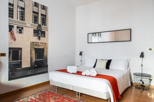 Un pat sau paturi într-o cameră la Z8 Comfort In the Heart of Bologna