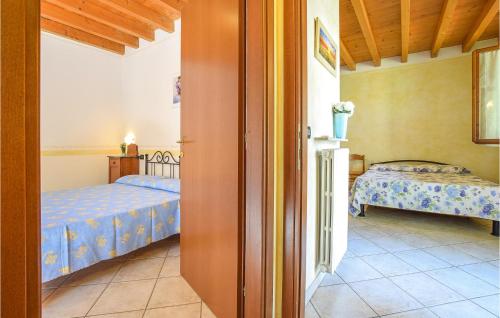 Letto o letti in una camera di Cozy Apartment In Cavriana With Outdoor Swimming Pool