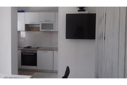 Kuchyň nebo kuchyňský kout v ubytování Grapevine Studio Apartment