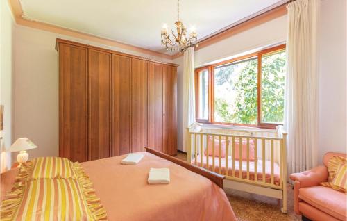 Un pat sau paturi într-o cameră la Villa Il Cedro