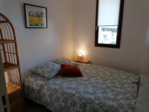 Postel nebo postele na pokoji v ubytování La Grande Bleue