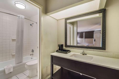 A bathroom at Clarion Inn & Suites