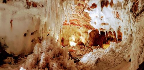 a view of a cave with snow and ice at Cardona Fira in Cardona