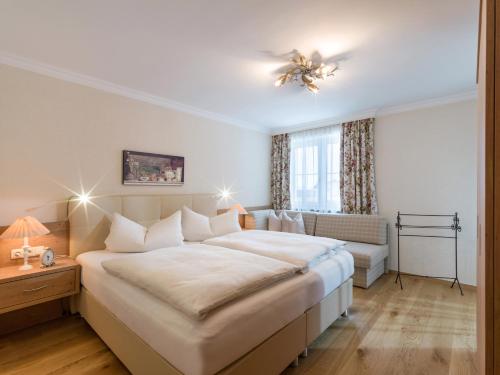 Una cama o camas en una habitación de Bergheim