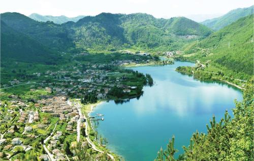 an aerial view of a town next to a lake at Baidoni Primo Piano in Ponte Caffaro
