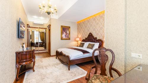 Ένα ή περισσότερα κρεβάτια σε δωμάτιο στο GREGORY Boutique Hotel Chisinau