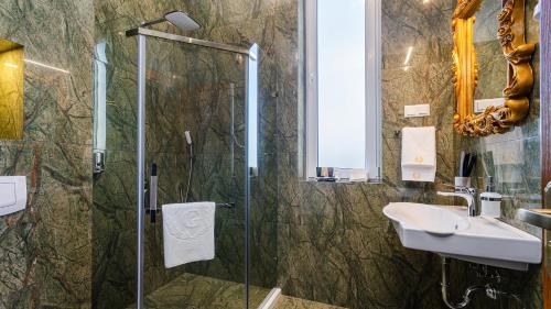 Ένα μπάνιο στο GREGORY Boutique Hotel Chisinau