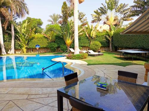 Bazén v ubytování Beautiful Luxurious Villa At Stella Di Mare Ain El Sokhna nebo v jeho okolí