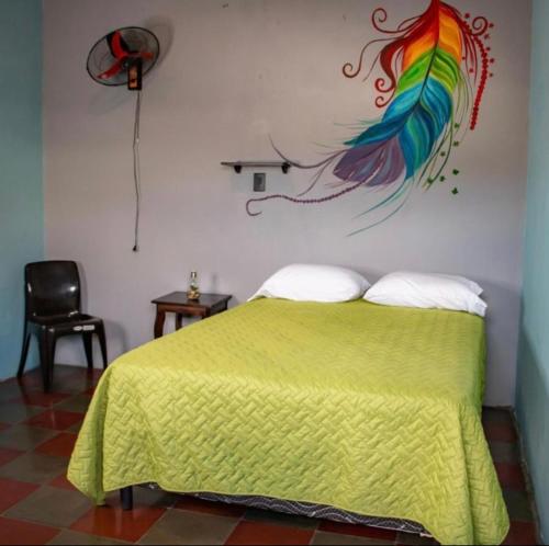 Säng eller sängar i ett rum på Hostal Casa Luna