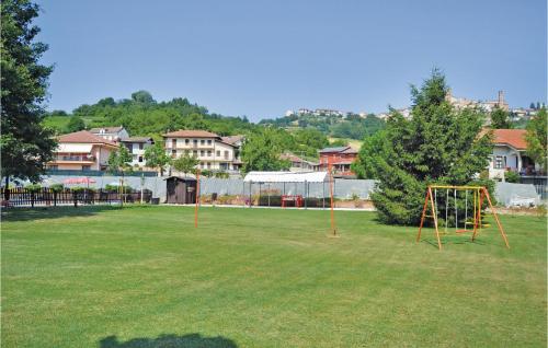 an empty park with a playground with at Le Rocche 1 in Cisterna dʼAsti