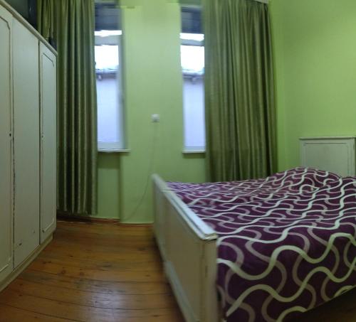 Ein Bett oder Betten in einem Zimmer der Unterkunft GUEST HOUSE "BUBU"
