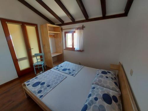 Posteľ alebo postele v izbe v ubytovaní Apartments Božena