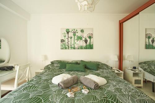 Postel nebo postele na pokoji v ubytování Encosta Retreat
