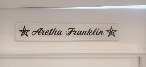 a sign that says alma tranquillity hanging over a door at Prau Riu Hotel Hyundai-Asturdai in Llanes