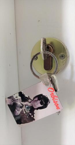 a door lock with a picture of a person on it at Prau Riu Hotel Hyundai-Asturdai in Llanes