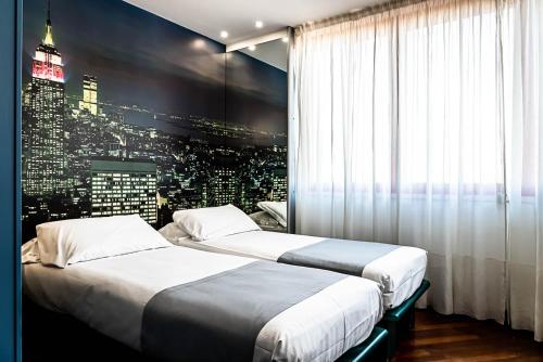 Кровать или кровати в номере Business Hotel