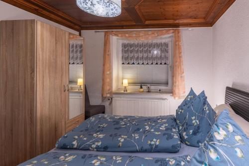 Llit o llits en una habitació de Ferienwohnung Am Kreidebach
