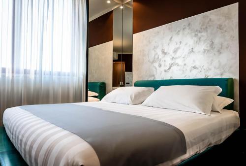 Кровать или кровати в номере Business Hotel