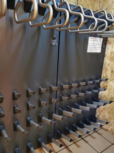 a wall of wine racks in a wine cellar at Résidence Julianna , trajets remontées mécaniques , livraison viennoiseries, piscine couverte in Morzine