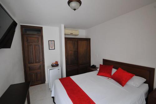 
Un ou plusieurs lits dans un hébergement de l'établissement Hotel San Julian
