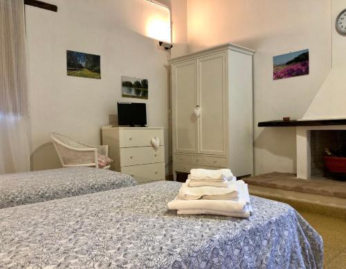Ένα ή περισσότερα κρεβάτια σε δωμάτιο στο Masseria La Torre