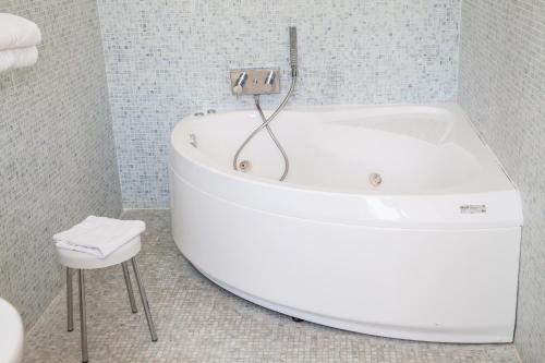 Koupelna v ubytování Hotel Paclà