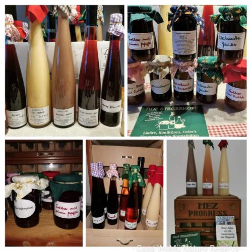 a collage of pictures of different bottles of wine at Casa WaMü Nature Reserve direkt am Altrhein in Xanten
