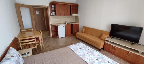 A television and/or entertainment center at Central Plaza - Studio - Sunny Beach