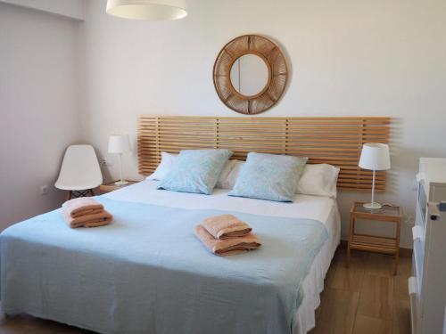 En eller flere senge i et værelse på SOUTH STAR. ESTRELLA DEL SUR