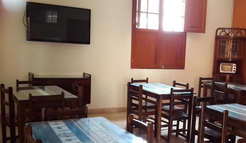 TV a/nebo společenská místnost v ubytování Hostal La Casona