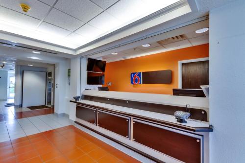 an office lobby with a pepsi sign on the wall at Motel 6-Lewisville, TX - Dallas in Lewisville