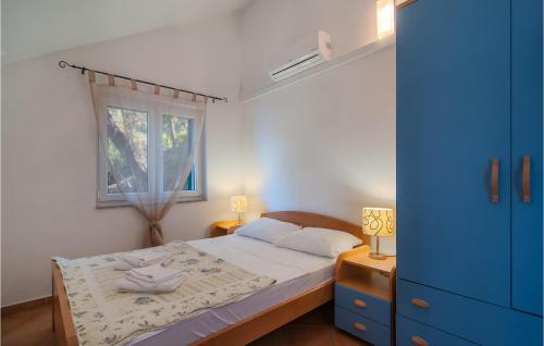 Voodi või voodid majutusasutuse Beautiful Home In Zarace With 4 Bedrooms And Wifi toas