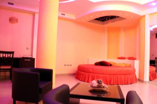 Postel nebo postele na pokoji v ubytování Hotel Sette E Mezzo