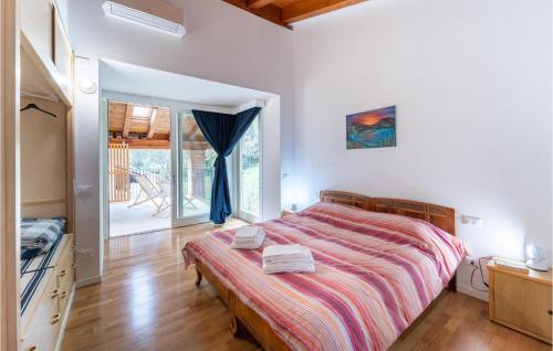Giường trong phòng chung tại Loggia Dal Lago