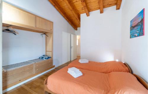 Postel nebo postele na pokoji v ubytování Loggia Dal Lago