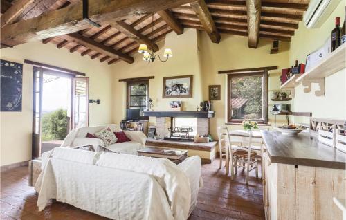 a living room with a couch and a table at Licia in Santa Maria di Ramici