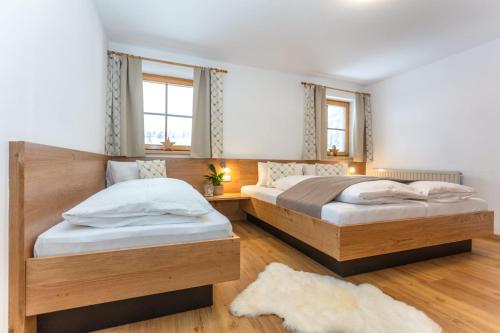 En eller flere senge i et værelse på Buchauhof Maria Alm