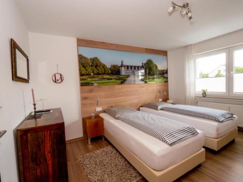 Ein Bett oder Betten in einem Zimmer der Unterkunft Fewo Papst Nordborchen
