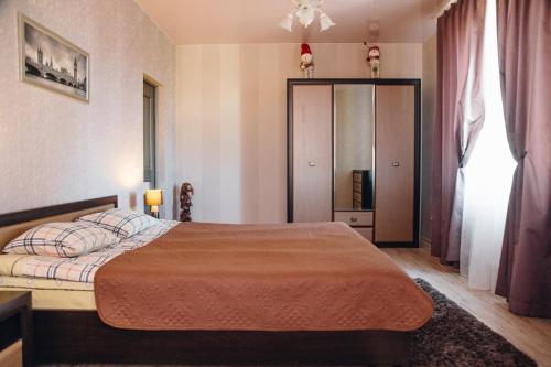 Postel nebo postele na pokoji v ubytování Apartment on Shashkevicha 16