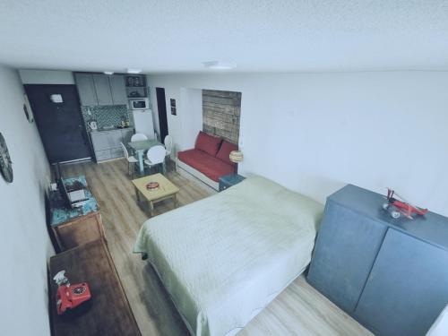 Katil atau katil-katil dalam bilik di Apartamento Monoambiente en "Edificio Chesterfield"
