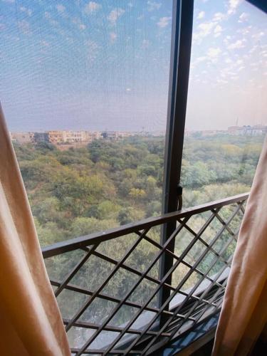 a view of a view from a window on a bus at Holidazzle Serviced Apartments Bahria Town in Rawalpindi