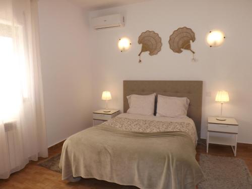 Katil atau katil-katil dalam bilik di Villa Claramar