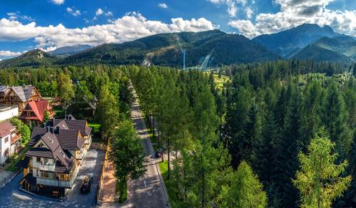 an aerial view of a town in the mountains at Willa pod Orłem - Zakopane in Zakopane