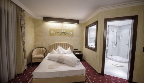 Voodi või voodid majutusasutuse Hotel Maria Theresia toas