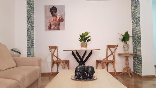 A seating area at Duquesa María Apartamento en el corazón de Granada