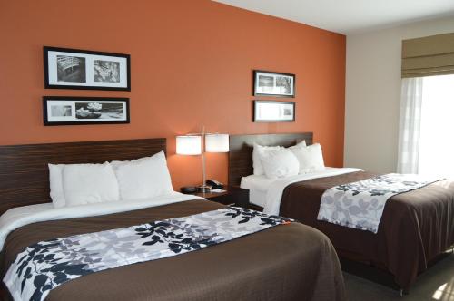 Krevet ili kreveti u jedinici u okviru objekta Sleep Inn & Suites Elk City